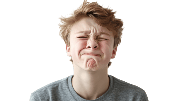 A Lighthearted and Humorous Portrait of a Teenage Boy Grimacing with a Funny Face Perfect for Social Media and Youth-Related Content Creation. png