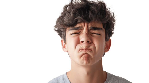 A Teenage Boy Exhibiting Disgust with a Wrinkled Forehead, Perfect for Illustrative Purposes in Emotional or Adolescent Theme Projects. png