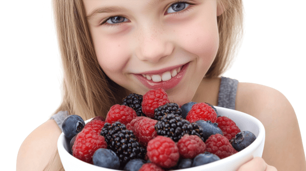 A Teenage Girl Enjoying a Bowl of Fresh Berries Perfect for Health Blogs or Culinary Articles. png