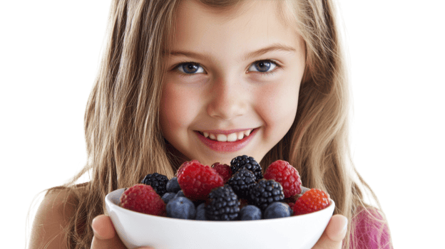 A Teenage Girl Relishing a Bowl of Fresh Berries - Perfect for Healthy Eating Blogs and Nutrition Content. png