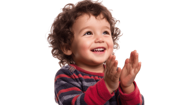 Joyful Toddler Clapping Hands in Excitement - Perfect for Capturing the Innocence of Childhood Play and Happiness. png