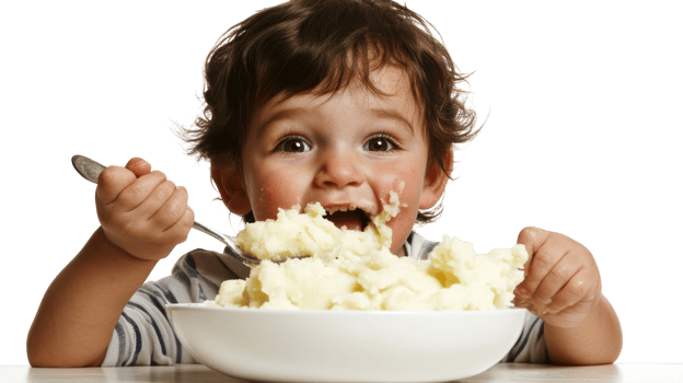 A Delightful Scene of a Toddler Enjoying Mashed Potatoes with a Spoon, Perfect for Illustrating Nutrition and Family Meal Times. png
