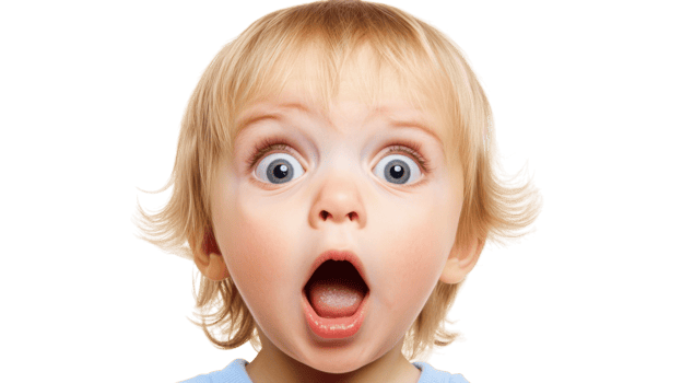 A Surprised Toddler with Open Mouth Capturing Innocent Wonder and Joyful Discovery for Family and Parenting Themes. png