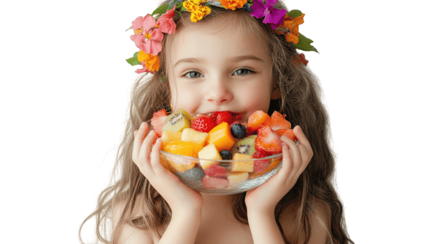Delightful Image of a Young Girl Enjoying a Colorful Bowl of Fresh Fruit Salad Perfect for Health and Nutrition Promotions. png
