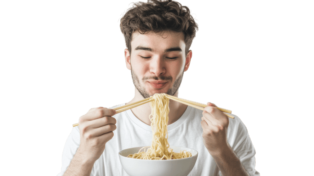 Delicious Bowl of Ramen Noodles Being Enjoyed by a Young Man Perfect for Food Blogs, Culinary Articles, and Restaurant Promotions. png