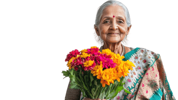 An elderly woman gracefully draped in a traditional sari, symbolizing cultural heritage, wisdom, and the beauty of age in a vibrant and picturesque setting.. png