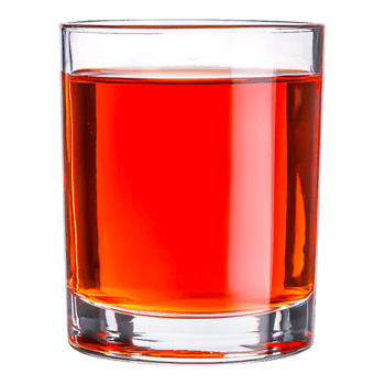 Close-Up of a Glass Filled with Bright Orange Liquid png