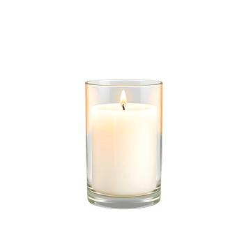 A candle is lit in a glass on a black background png