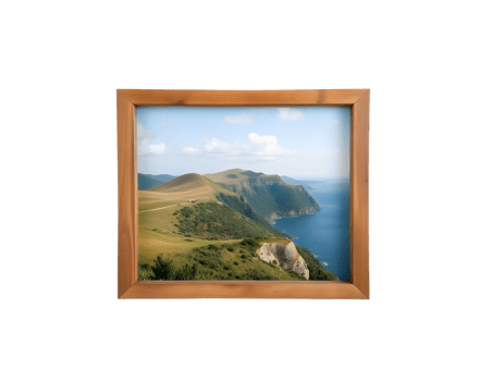 A picture frame with a view of the ocean and mountains png