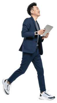 Businessman in stylish suit walking with a tablet, cut out transparent png