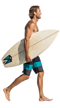 Surfer walking along the beach with a surfboard, cut out transparent png