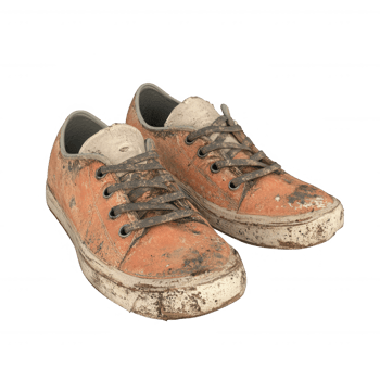 Worn and dirty orange sneakers symbolizing active lifestyle and adventure. png