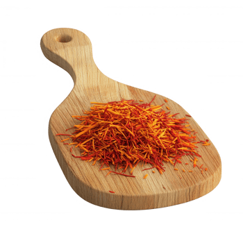 A vibrant pile of saffron strands on a wooden cutting board, highlighting culinary artistry. png