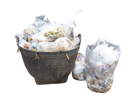 Garbage and offal pile in transparent white plastic bag at garbage dump isolated with clipping path in file format png