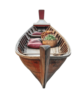 A wooden boat filled with fruits and cushions, ready for a market or leisurely ride. png