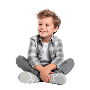 A cheerful boy sitting cross-legged in a casual outfit smiling. png