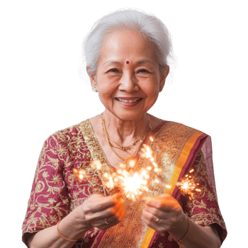Joyful elderly woman celebrating with sparkler in traditional attire, showcasing happiness. png