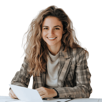 Smiling young professional woman working at desk with a tablet and papers. png