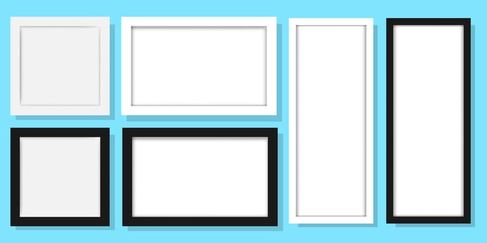 various blank white photo frames on a blue background vector