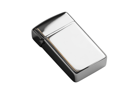 Metallic lighter resting on a surface reflecting light in a well-lit environment png