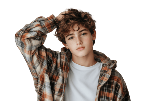 Young male model poses casually in a stylish plaid shirt with a relaxed expression in a studio setting png