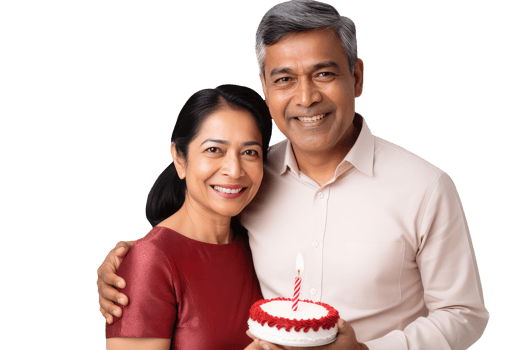 Happy Middle Age Indian Couple Standing to Close and Holding Cake with Burning Candles. A Fictitious Character Created By . png