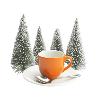 A small Christmas tree an orange cup, and a white saucer png