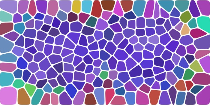 A vibrant multicolored mosaic pattern dominated by shades of purple, with irregular shapes outlined in white, creating a lively and artistic abstract composition. vector