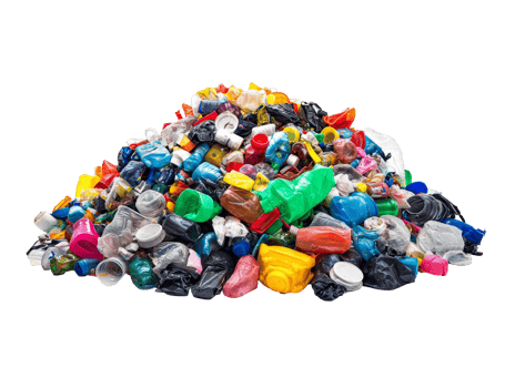 Piled plastic waste at recycling center png