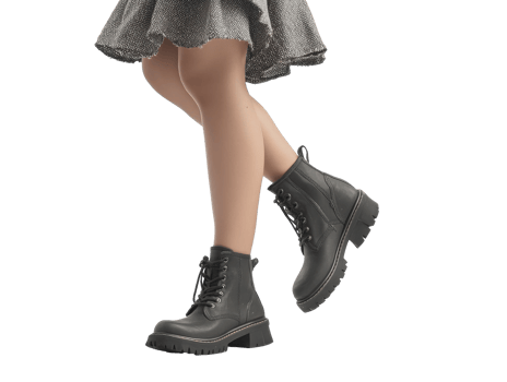 Stylish black boots complementing modern fashion png