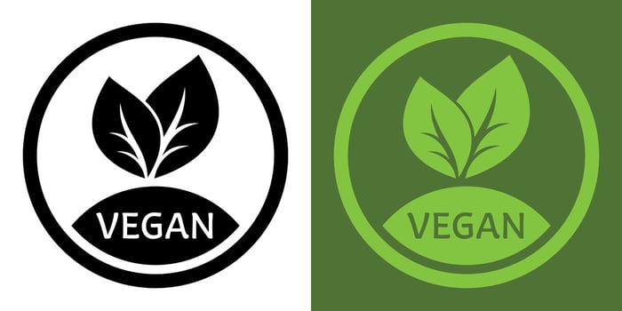 Round green vegan icon for stickers, labels and logos Vegan, meat free, lactose free, healthy, fresh food. Green Leaves Icon. vector