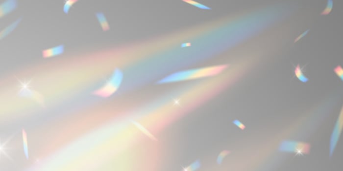 Rainbow light background with confetti vector