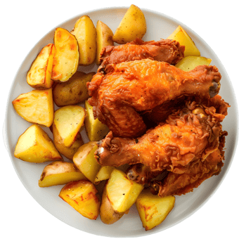 Fried Chicken Drumsticks with Potato Slices on Plate Isolated on Transparent Background png