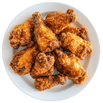 Fried chicken in white bowl, top view. png