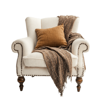 Cozy armchair adorned with a soft throw blanket and decorative pillow in a serene setting on a transparent background, Cozy Armchair on a transparent background png