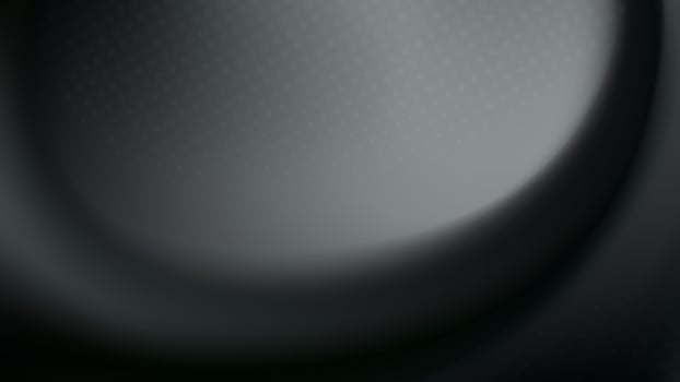 Abstract background with a dark grey swirl and subtle light effect vector