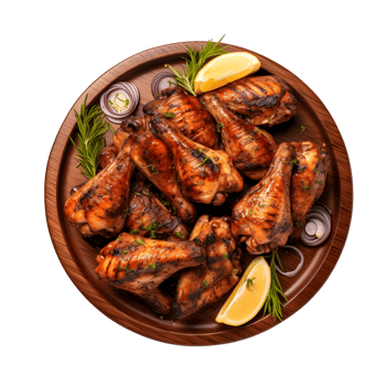 Top viegrilled chicken wings on a wooden plate with lemon slices and rosemary png
