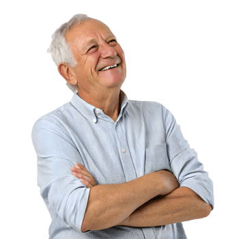 Senior man smiling with arms crossed, expressing joy and contentment in a cheerful moment indoors png