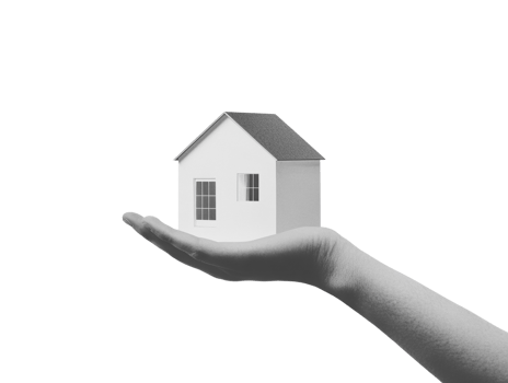 A small house model rests gently in a hand png