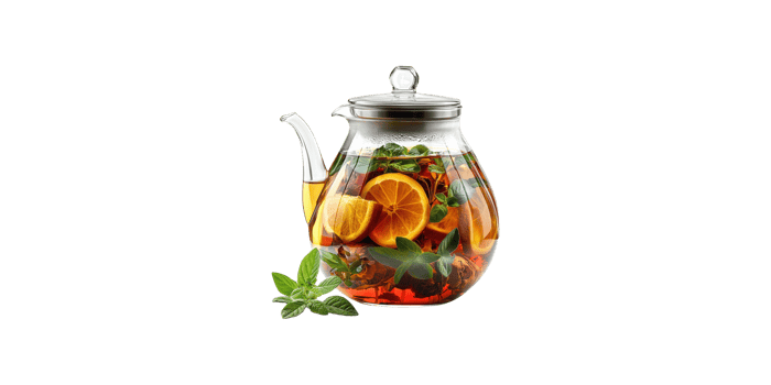 Glass teapot with lemon and mint infused tea isolated on transparent background png