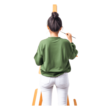 Creative Young Woman Painting on Canvas in Studio Environment png