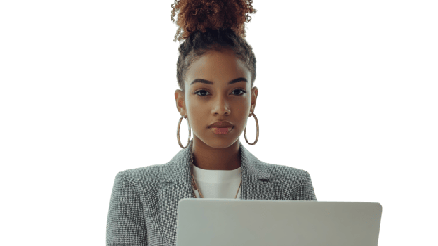 Young professional woman holds laptop with confidence while dressed in smart attire against light background png