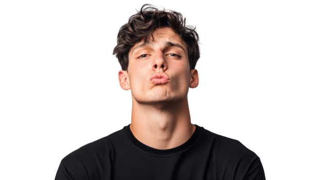 Young man making a playful kissing face with curly hair against a plain background png