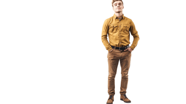 Young man posing confidently in a casual outfit against a light background during a studio session png