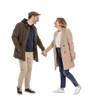 couple holding hands with heart sparkles on warm backdrop png