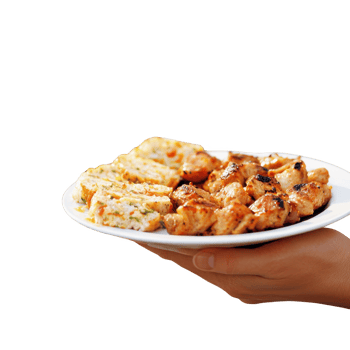 Delicious grilled chicken served with flavorful rice on a white plate. png