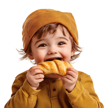 a little boy in a hat eating a croissant png