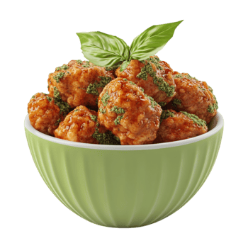 meatballs in green bowl with basil leaf on top of it png