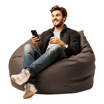 Young Man Relaxing on a Beanbag Chatting on His Cell Phone png