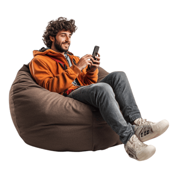 Young Man Relaxing on Beanbag Chatting on His Cell Phone png